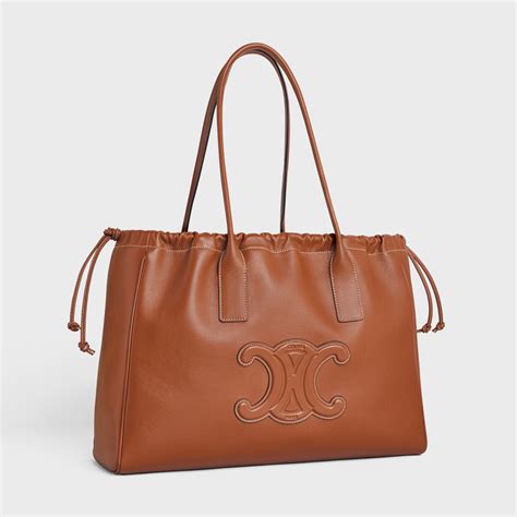 celine cabas drawstring cuir triomphe bag|celine cabas triomphe review.